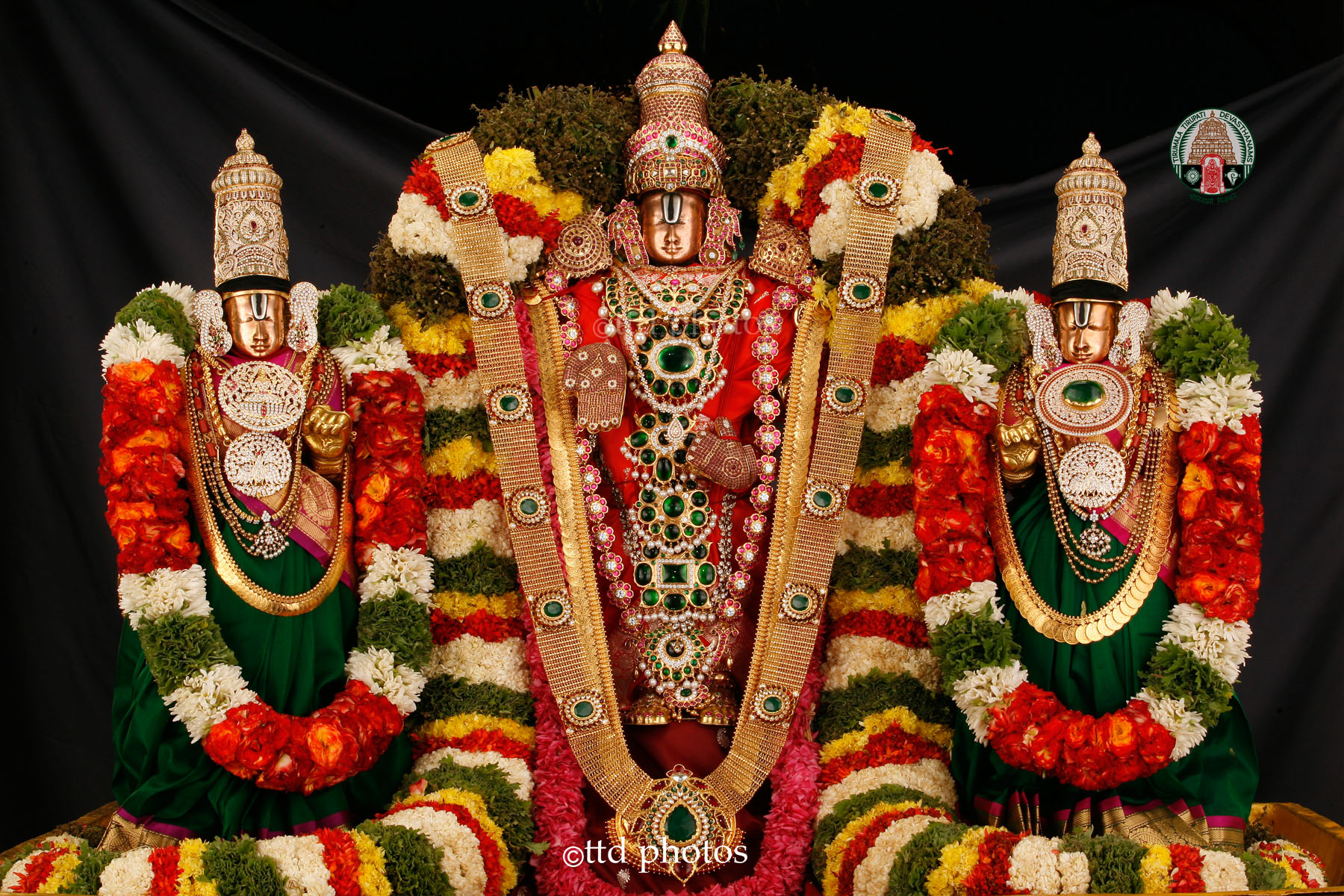 The majestic Tirumala Temple, surrounded by the verdant Tirumala Hills, reflecting its sacred history.