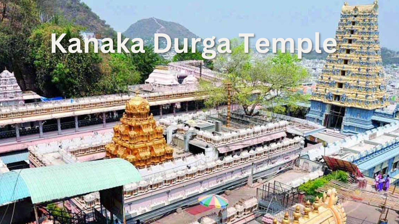 A stunning view of Kanaka Durga Temple on Indrakeeladri Hill, beautifully lit during Dasara celebrations.